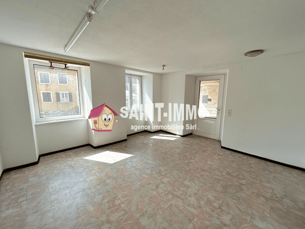 Immeuble locatif à réhabiliter de 4 appartements, un local, une parcelle constructible et un garage 17