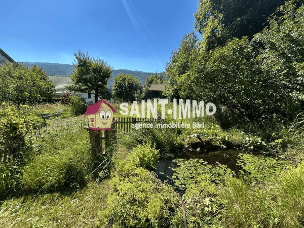 Charmant chalet avec dépendance, garage et jardin arboré sans vis-à-vis 2