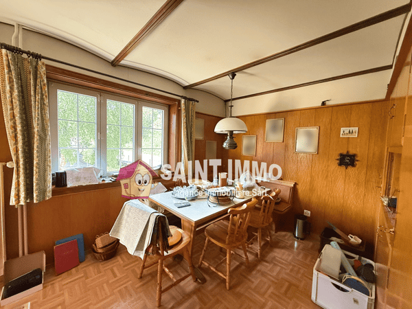 Chalet de deux appartements (3 & 6.5 pièces) avec jardin arboré de 840 m2, terrasse et garages 16