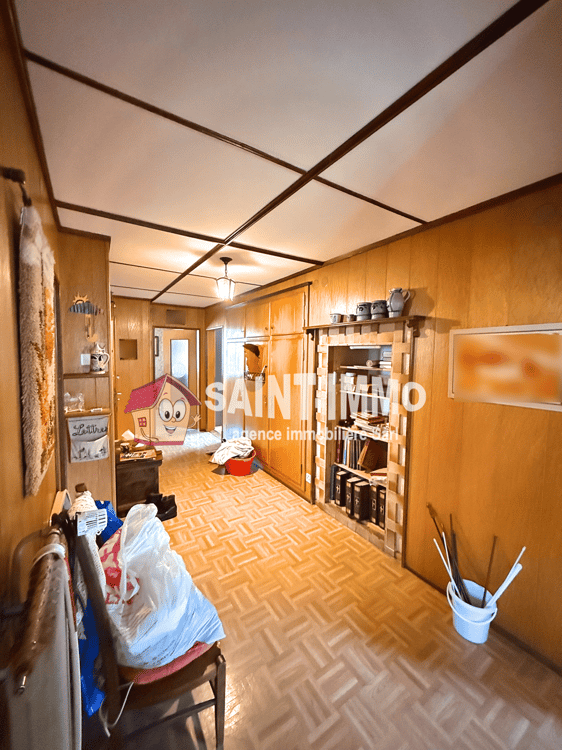 Chalet de deux appartements (3 & 6.5 pièces) avec jardin arboré de 840 m2, terrasse et garages 12