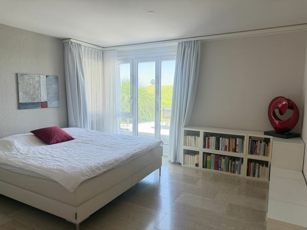 3,5 Zimmer Terrassenhaus in ruhiger, sonniger Lage mit unverbaubarer Weitsicht auf den Zürichsee und in die Alpen 7
