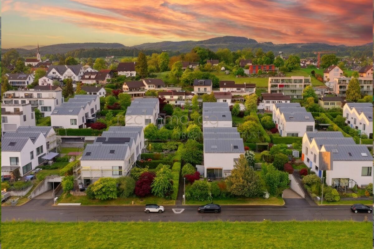 Familienfreundliches 6.5-Zimmer-Reiheneckhaus mit Garten und direktem Tiefgaragenzugang in Obfelden