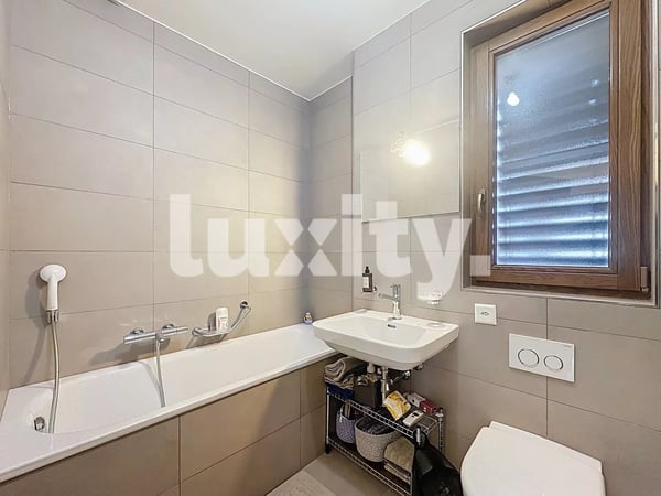 Attique rénové avec confort moderne 3