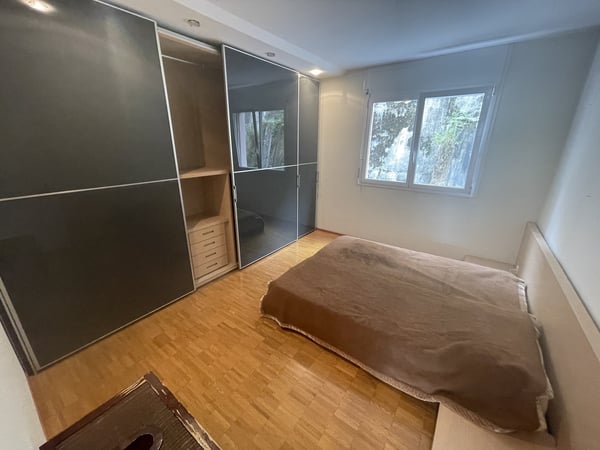 APPARTAMENTO 1.5 CON SPLENDIDA VISTA CITTA' E PARZIALE LAGO 9