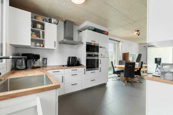 2 Familienhaus - 5.5 Zi und 4.5 Zi 9