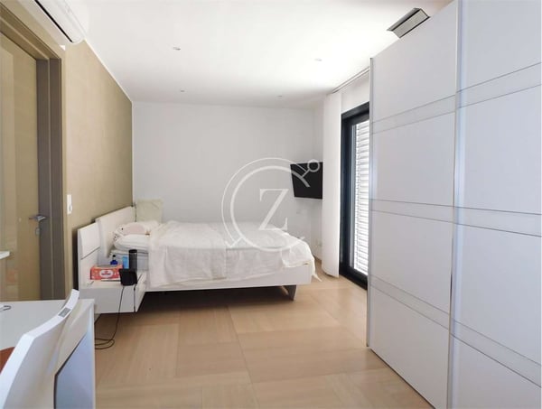 Moderna casa con piscina a Bedano 10