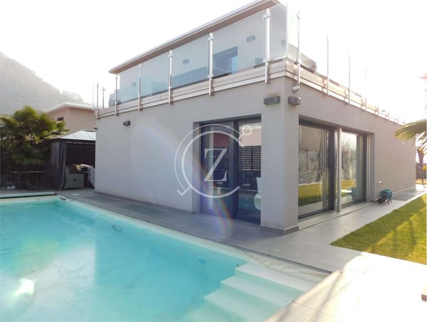 Moderna casa con piscina a Bedano 4