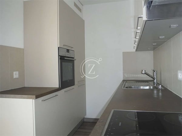 Elegante attico di 3.5 locali con vista panoramica e piscina condomini 5