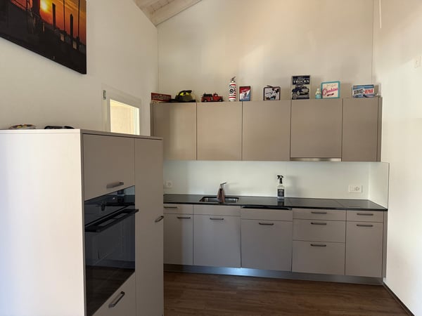 Einmaliges Mehrfamilienhaus mit Zwei Wohnungen und Ladenlokal 9