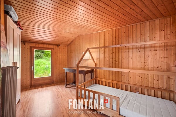 Chalet de caractère avec rendement locatif 11