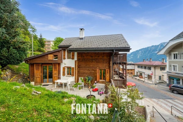 Chalet de caractère avec rendement locatif 26