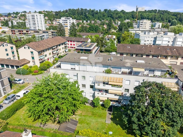 Familienfreundlich, sonnig und gepflegt mit zwei Balkonen, Gartensitzplatz und Garage 1