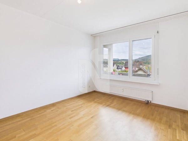 Attraktive 3.5-Zimmer-Wohnung mit 15 m² Balkon und Lift an gut erschlossener Lage in Rheinnähe 4