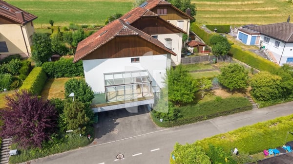 Familienfreundliches Reiheneckhaus mit zwei Gartenbereichen, Weitsicht und Garage 1
