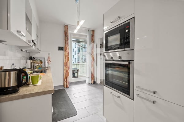 Grosszügiges Wohnen mit Balkon und Gemeinschaftsgarten in Basel 5