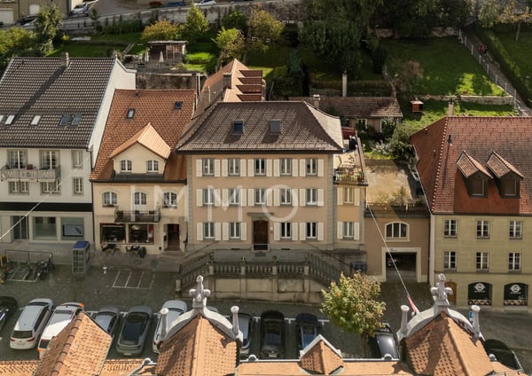Opportunité unique au coeur de Romont lmmeuble mixte à vendre 1