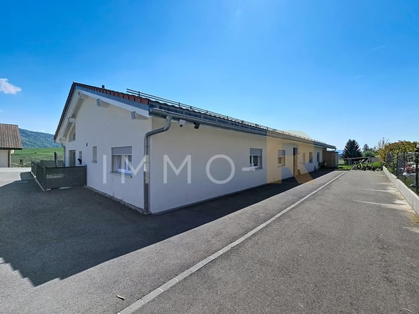 Appartement 3,5 pièces avec jardin et vue dégagée 1
