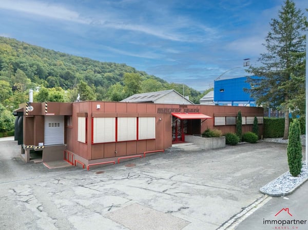 Vielseitiges Gewerbe- und Einzelhandelsobjekt mit Tiefgarage 24