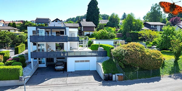 Maison de deux appartements avec grande parcelle à Courtepin ! 1