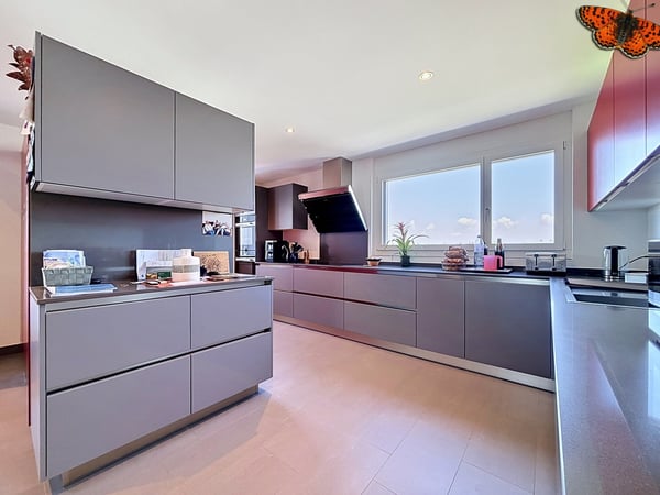 Maison de deux appartements avec grande parcelle à Courtepin ! 4