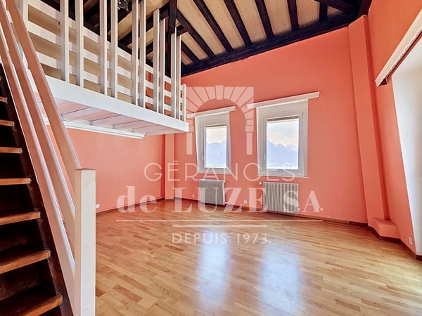 Surplombant le lac : 2.5 pièce avec mezzanine et balcon 7