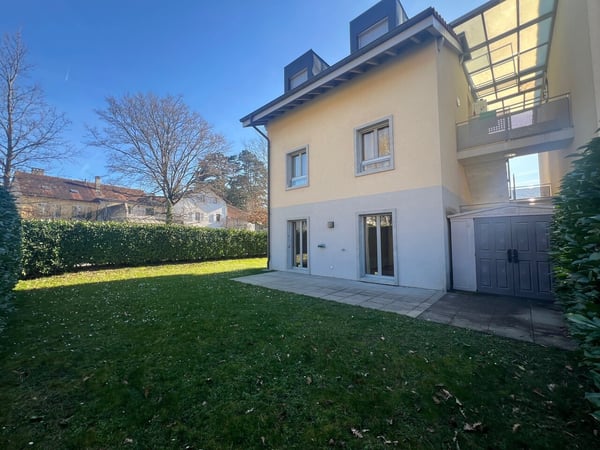 Appartement de 4 pièces avec terrasse et jardin 1