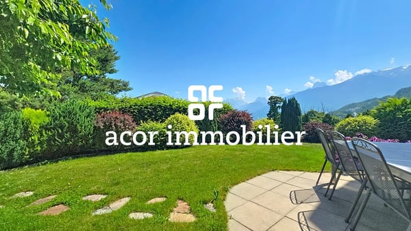 Villa aux volumes spectaculaires face aux Alpes 7
