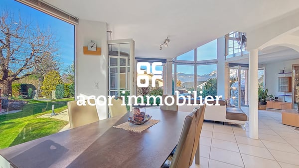Villa aux volumes spectaculaires face aux Alpes 3