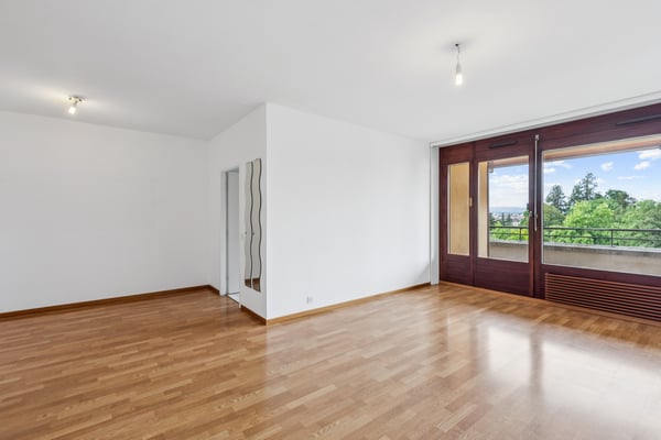 EXCLUSIVITE - Bel appartement de 4 pièces en étage élevé 1