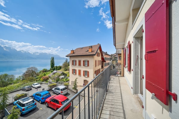 Immeuble d'habitation entièrement rénové avec vue lac 11