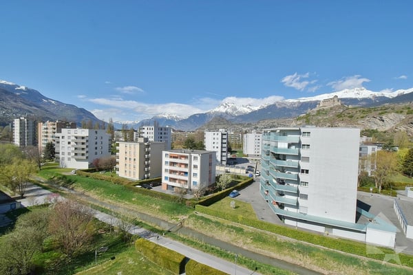 1.5 pcs avec une magnifique vue et 1 place de parc intérieure 3