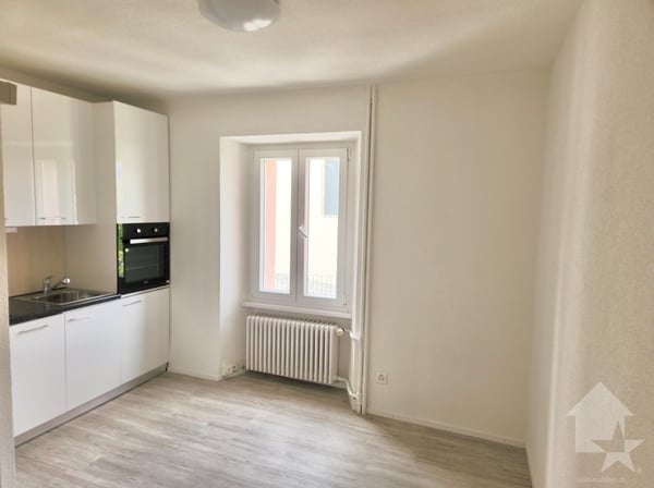 Immeuble de 5 appartements et un restaurant au centre du village ! 13