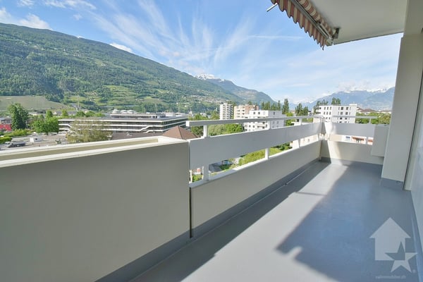 4.5 pièces avec une magnifique vue et 1 place de parc intérieure 1