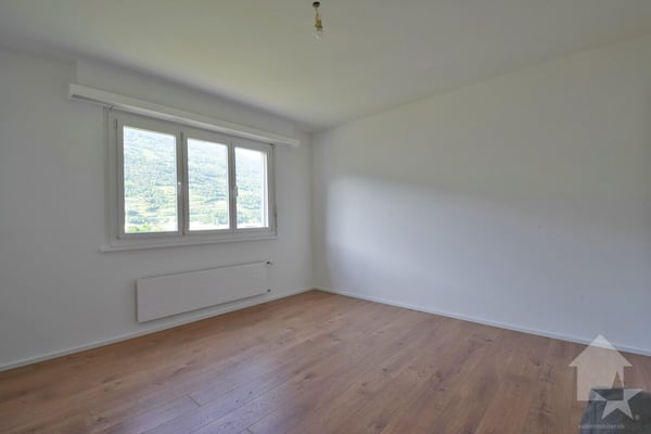 4.5 pièces avec une magnifique vue et 1 place de parc intérieure 11