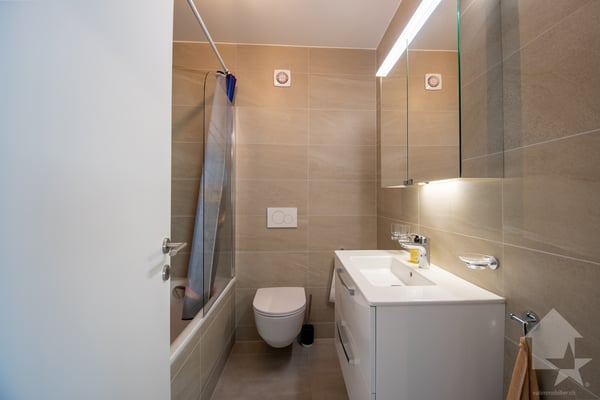 Appartement de 2.5 pièces avec terrasse et jardin 13