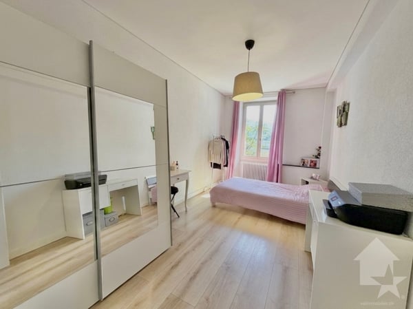 Appartement de 2.5 pièces rénové avec garage box ! 7