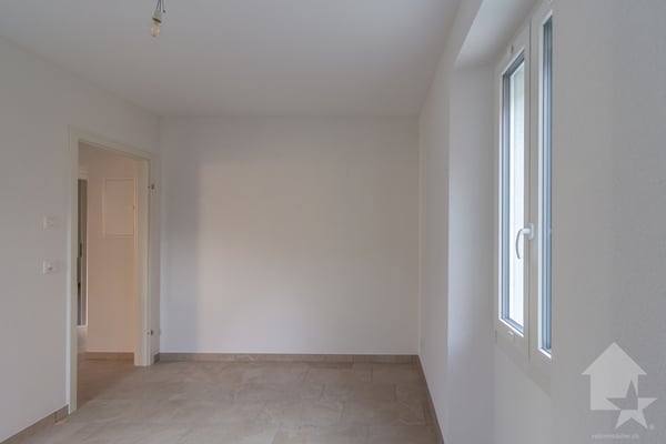 Bâtiment de trois appartements entièrement rénové avec goût 11