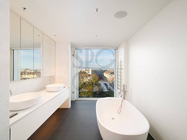 Triplex d'exception avec vues imprenables sur le lac et les Alpes 11