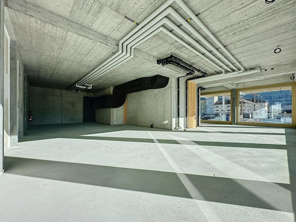 Superbe arcade commerciale de 272.46 m2 à louer dans le nouveau quartier Cour de Gare à Sion 1