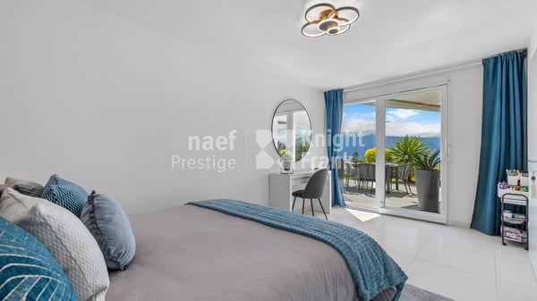 Maison jumelle de 7.5 pièces en triplex avec une vue panoramique sur le lac à vendre à Montreux 9