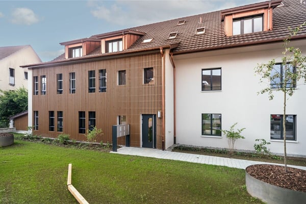 Raffinierte 1.5-Zimmer-Neubaudachwohnung mit offener Galerie und Mansardenzimmer 1