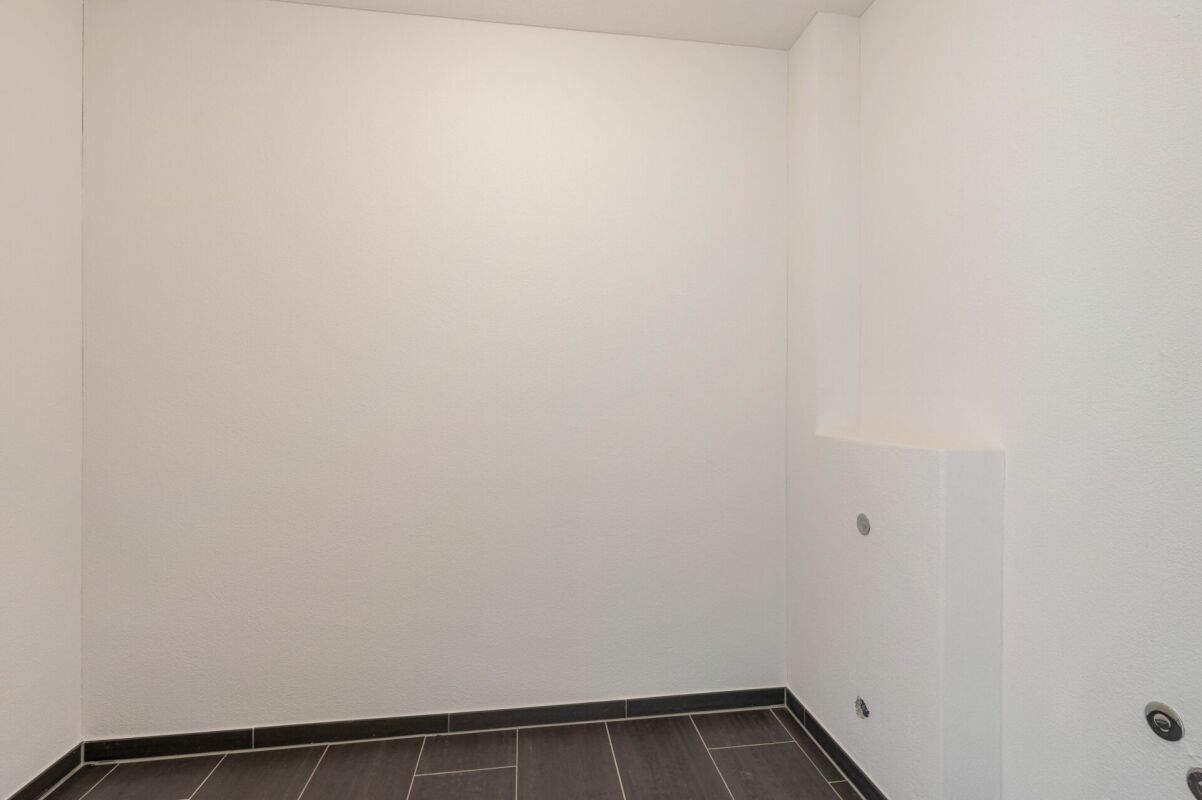 Grosszügige Erdgeschosswohnung mit grossem Garten im ruhigen und beliebten Wohnquartier 