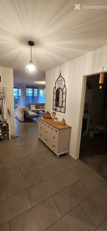 4.5 pièces au rez avec terrasse, jardin et parking couvert 1