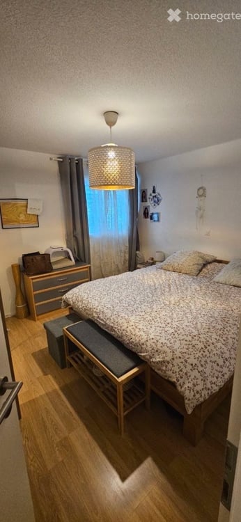 4.5 pièces au rez avec terrasse, jardin et parking couvert 3