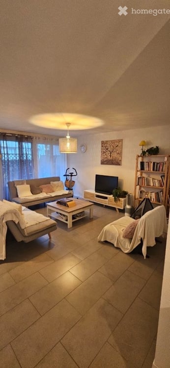 4.5 pièces au rez avec terrasse, jardin et parking couvert 2