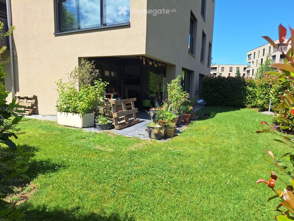 Beau 3.5Pce avec jardin et place de parc souterraine 1