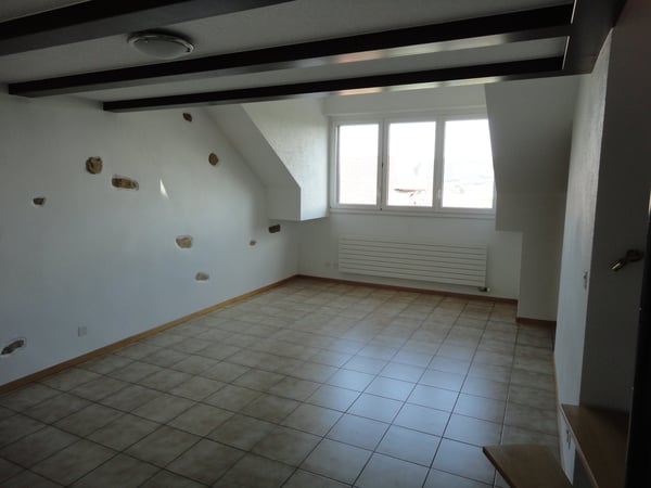 Cornaux, charmant attique avec mezzanine à louer 2