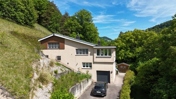 Maison à vendre de 6.5 pièces dans le village de Soyhières 1