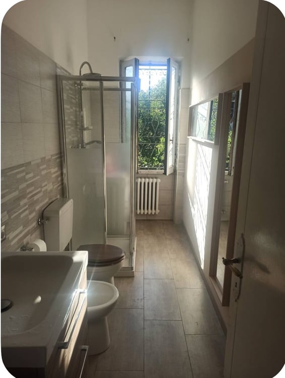Appartamento in villa con giardino 5
