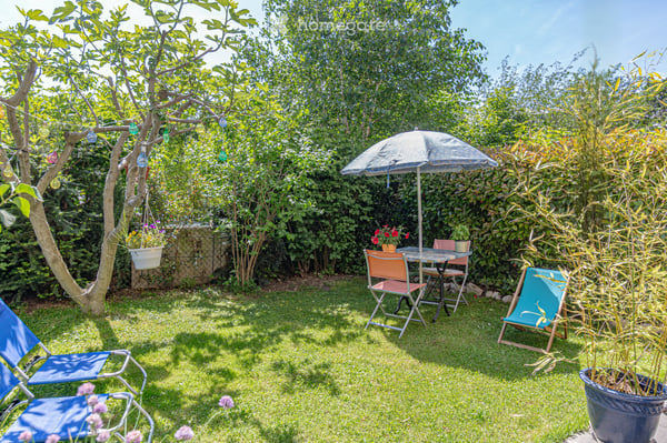 Appartement traversant de 117m² avec terrasse et jardins 3